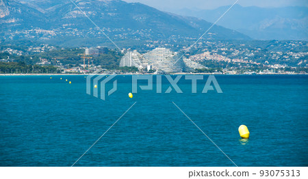 Buildings and beach of Villeneuve Loubet on the French riviera Buildings and beach of Villeneuve Loubet on the French riviera 93075313