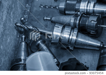 The group of various size of drill tools in the container box. The group of various size of drill tools in the container box. 93075454