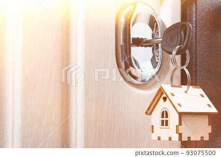 Buying a house. The key is in the lock. New flat. Getting the keys. Buying a house. The key is in the lock. New flat. Getting the keys. 93075500