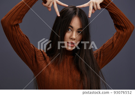 portrait woman fun brown sweater posing casual wear isolated background portrait woman fun brown sweater posing casual wear isolated background 93076552