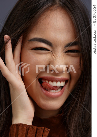 woman brown sweater glamor posing smile fashion studio model woman brown sweater glamor posing smile fashion studio model 93076554