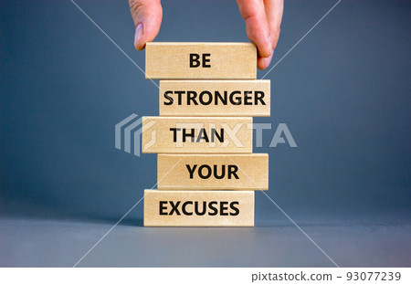 Be stronger symbol. Concept words Be stronger than your excuses on wooden blocks on a beautiful grey table grey background. Businessman hand. Business motivational and be stronger concept. Be stronger symbol. Concept words Be stronger than your excuses on wooden blocks on a beautiful grey table grey background. Businessman hand. Business motivational and be stronger concept. 93077239