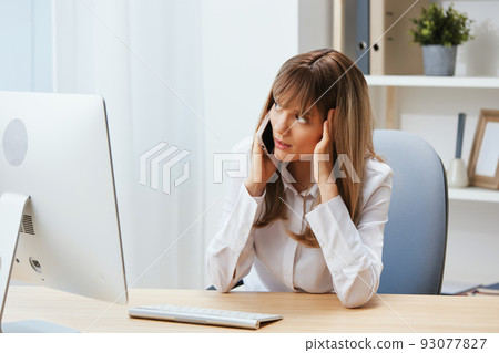 Serious adorable blonde businesswoman worker make difficult decision talking with client in call in light modern office. Nervous employee work on computer online in support service. Copy space Serious adorable blonde businesswoman worker make difficult decision talking with client in call in light modern office. Nervous employee work on computer online in support service. Copy space 93077827