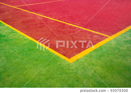 Lawn tennis court and net close up Lawn tennis court and net close up 93078308