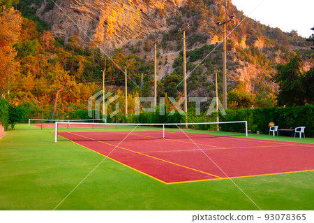 Lawn tennis court and net close up 93078365