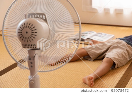 Child taking a nap during summer vacation 93078472