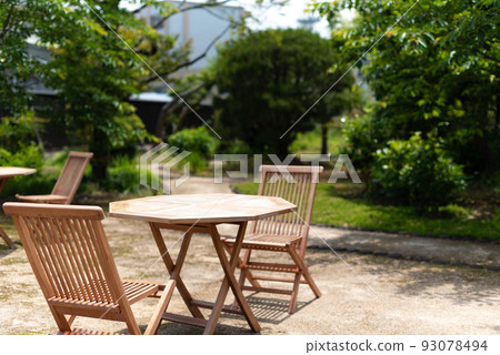 table in the garden table in the garden 93078494