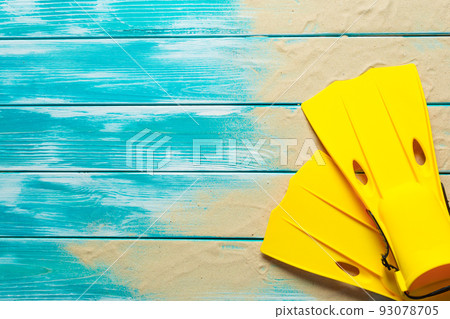 fins lying on the wooden boards 93078705