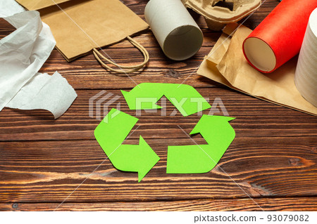 Eco concept with recycling symbol on table background top view 93079082