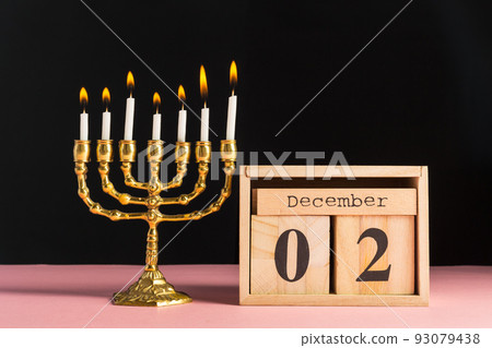 Bronze Hanukkah menorah with burning candles Bronze Hanukkah menorah with burning candles 93079438