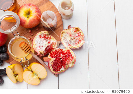 Apple and honey, traditional food of jewish New Year - Rosh Hashana. Apple and honey, traditional food of jewish New Year - Rosh Hashana. 93079460