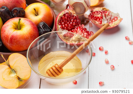 Apple and honey, traditional food of jewish New Year - Rosh Hashana. Apple and honey, traditional food of jewish New Year - Rosh Hashana. 93079521