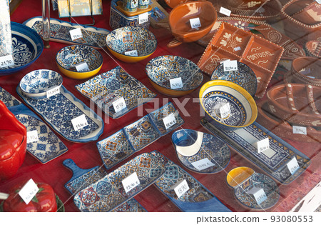 Souvenirs Background with colorful Portuguese blue ceramics Souvenirs Background with colorful Portuguese blue ceramics 93080553