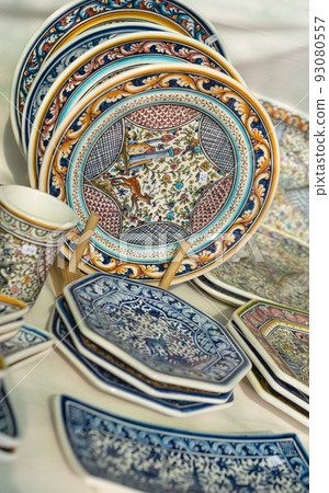 Stall with colorful Portuguese ceramics Stall with colorful Portuguese ceramics 93080557