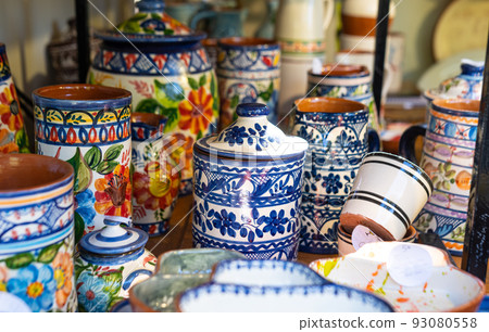 Stall with colorful Portuguese ceramics Stall with colorful Portuguese ceramics 93080558