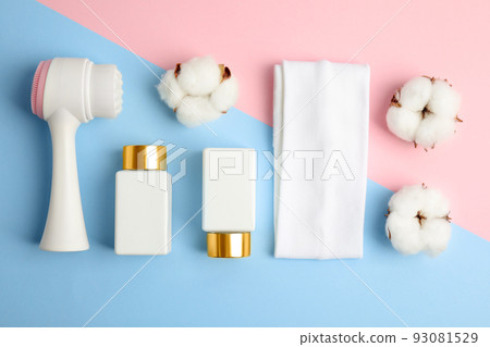 Flat lay composition with face cleansing brush on color background. Cosmetics tool Flat lay composition with face cleansing brush on color background. Cosmetics tool 93081529
