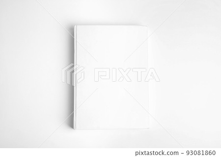 Old book with blank cover on white background, top view 93081860