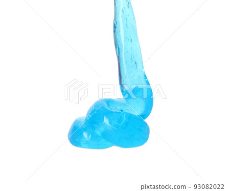 Flowing light blue slime on white background. Antistress toy Flowing light blue slime on white background. Antistress toy 93082022