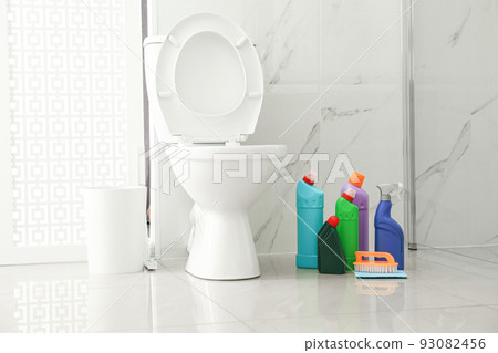 Toilet bowl and cleaning supplies in modern bathroom Toilet bowl and cleaning supplies in modern bathroom 93082456