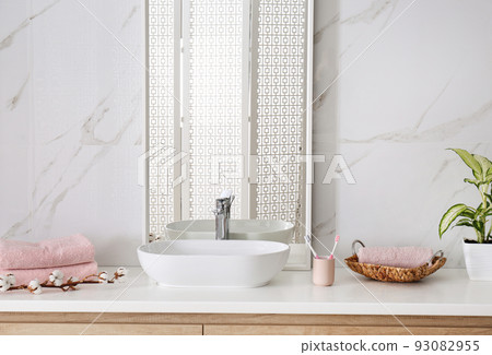 Modern mirror and vessel sink in stylish bathroom 93082955