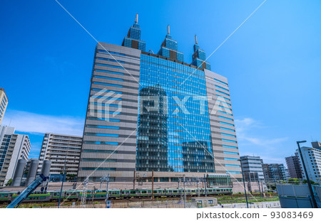 Cityscape of Kawasaki, Japan View of the NTT DoCoMo Kawasaki Building in front of Kawasaki Station 93083469