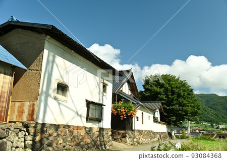 Appearance of an old house standing on a foundation of masonry 93084368