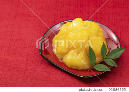 New Year dishes 1_Kurikinton on a red plate_Background red New Year dishes 1_Kurikinton on a red plate_Background red 93086565