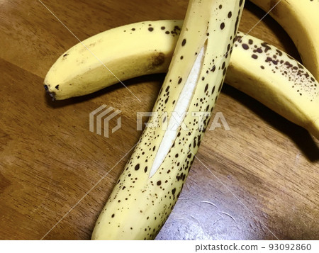 Ripe and peeled banana Ripe and peeled banana 93092860
