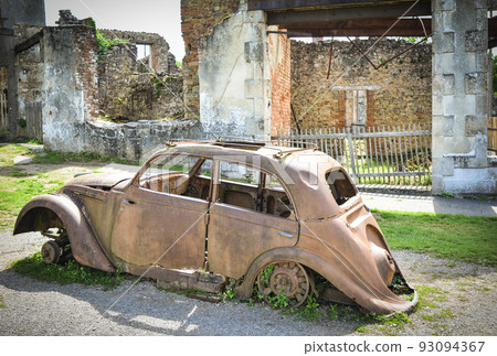 Destroyed cars during World War 2 in Oradour sur Glane 93094367