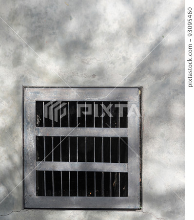 Steel drain cover on concrete floor, pipe system Steel drain cover on concrete floor, pipe system 93095460