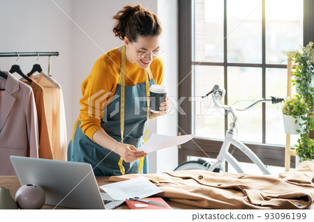 Woman is working at workshop Woman is working at workshop 93096199