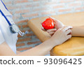 nurse is checking patience's pulse, 93096425