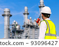 Engineer is checking around gas turbine electric power plant 93096427