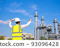 Engineer is hand rise up at electric power plant 93096428