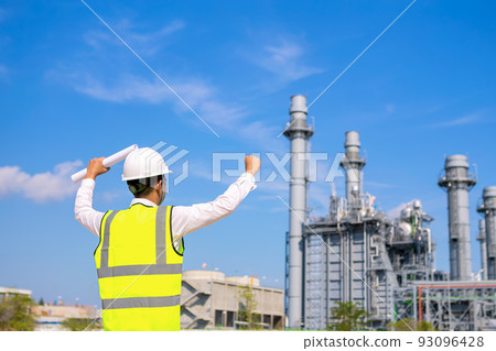 Engineer is hand rise up at electric power plant Engineer is hand rise up at electric power plant 93096428