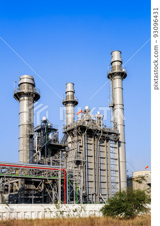 Gas turbine electrical power plant at dusk with blue sky Gas turbine electrical power plant at dusk with blue sky 93096431