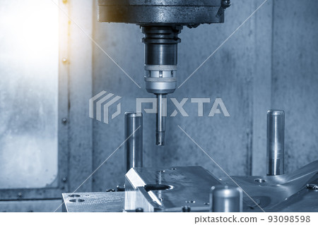 The CNC milling machine rough cutting the press die parts by indexable tools. 93098598