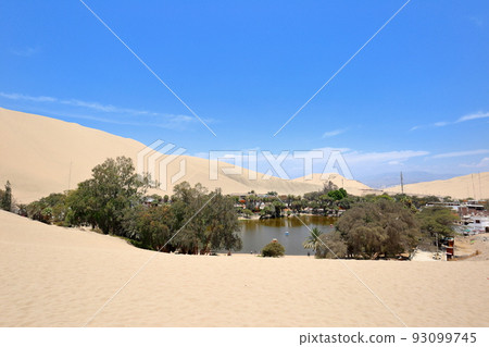 Huacachina desert and oasis, tourist destination in Peru, South America Huacachina desert and oasis, tourist destination in Peru, South America 93099745