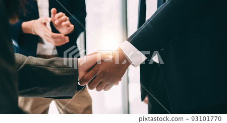 businessman handshake for teamwork of business merger and acquisition businessman handshake for teamwork of business merger and acquisition 93101770