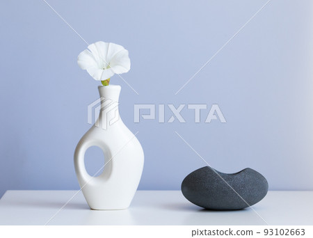 cosmetic product mock up with white boxes and vase 93102663