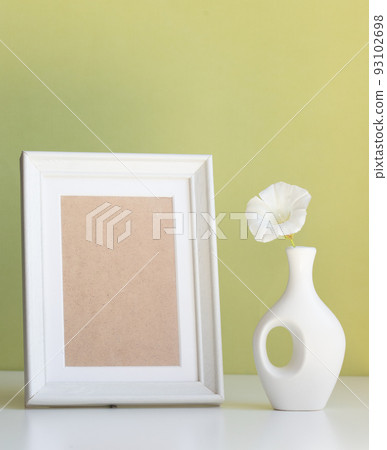 product mock up with white frame with space for text and white vase product mock up with white frame with space for text and white vase 93102698