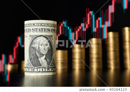 Rolled one dollar bill on the background of stacks of coins and Rising stock market chart 93104123