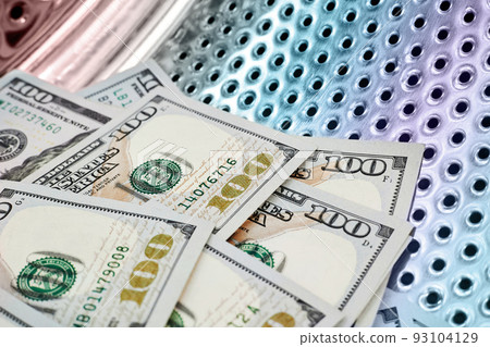 Close-up of washing dollars in machine, money laundering, financial fraud concept Close-up of washing dollars in machine, money laundering, financial fraud concept 93104129