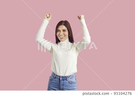 Excited woman make yes hand gesture 93104276