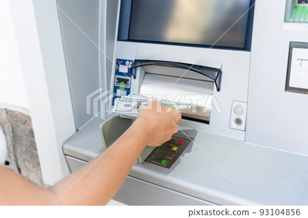 Atm money cash machine. Woman withdraw money bill. Holding american hundred dollar cash. Bank credit card, us dollar. 93104856