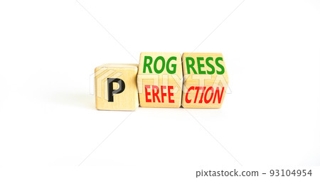 Progress or perfection symbol. Concept words Progress or Perfection on wooden cubes. Beautiful white table white background. Business progress or perfection concept. Copy space. 93104954