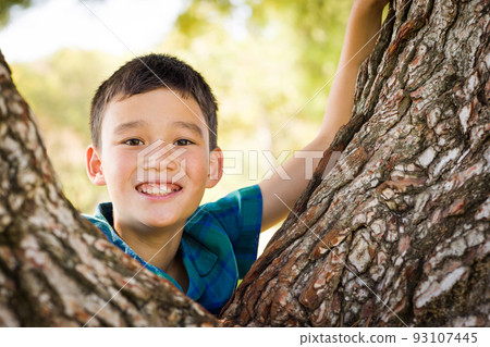 Outdoor portrait of a mixed race Chinese and Caucasian boy. Outdoor portrait of a mixed race Chinese and Caucasian boy. 93107445