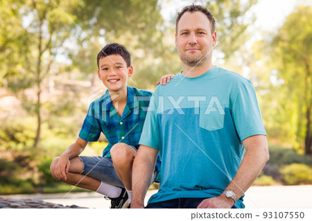 Outdoor portrait of mixed race Chinese and Caucasian father and son. Outdoor portrait of mixed race Chinese and Caucasian father and son. 93107550
