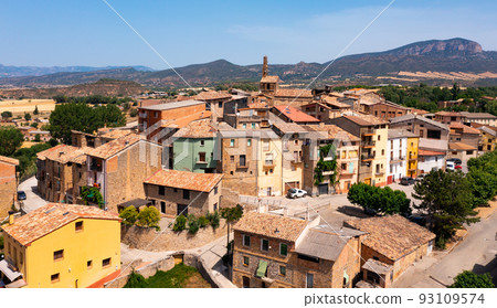 Drone view of Spanish township of Figuerola d Orcau on background of mountain range Drone view of Spanish township of Figuerola d Orcau on background of mountain range 93109574
