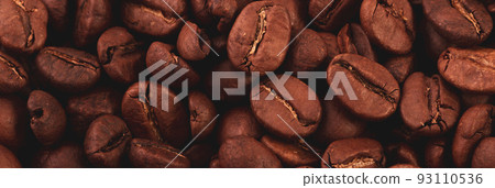 Coffee lover view of roasted coffee beans for background and texture. Dumped roasted coffee beans can be used as background and texture. Photo banner. roasted coffee Coffee lover view of roasted coffee beans for background and texture. Dumped roasted coffee beans can be used as background and texture. Photo banner. roasted coffee 93110536